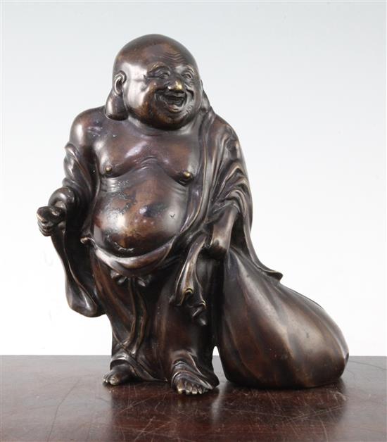 A Japanese bronze standing figure of Hotei, 19th century, 19cm